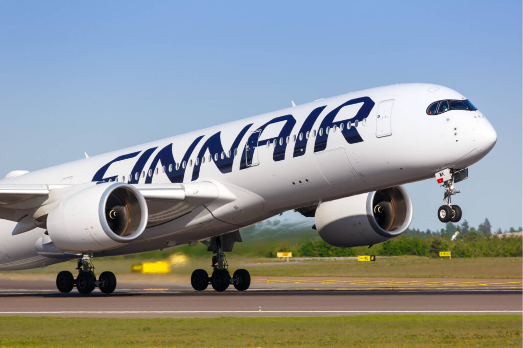 Finnair Airbus A350 airplane taking off at Helsinki Airport.