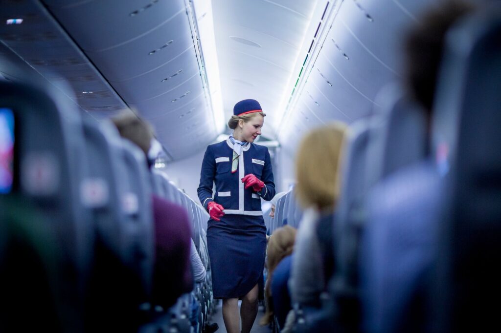 a flight attendant onboard a norwegian flight 1jpg a_flight_attendant_onboard_a_norwegian_flight-1.jpg