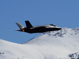 a_usaf_f-35a_lightning_ii_aircraft_flying_by_snowy_mountains.jpg