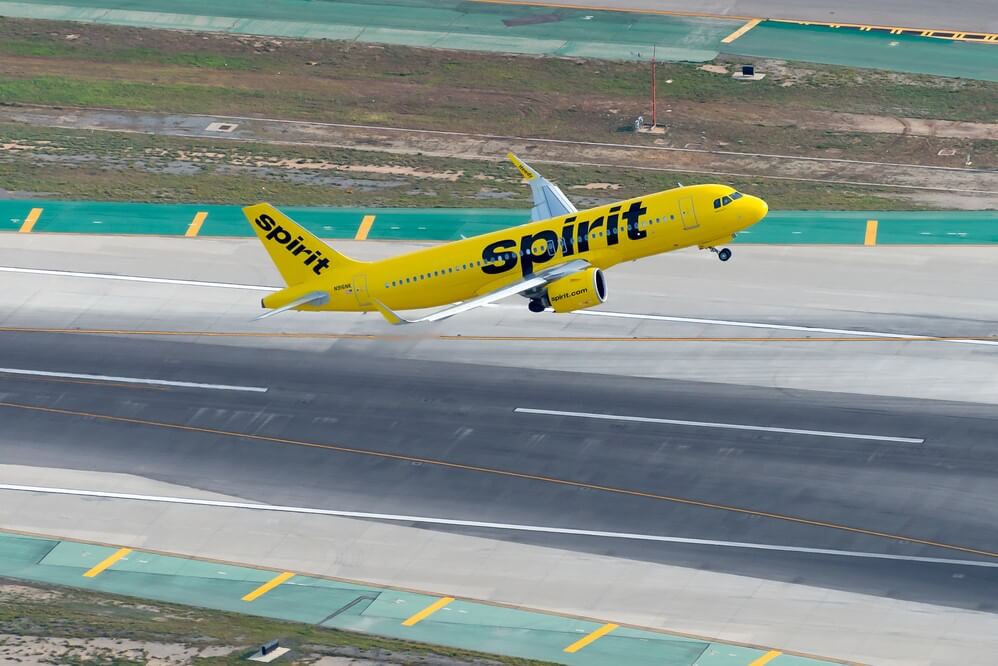 aerial_view_of_spirit_airlines_airbus_a320_departing_airport.jpg