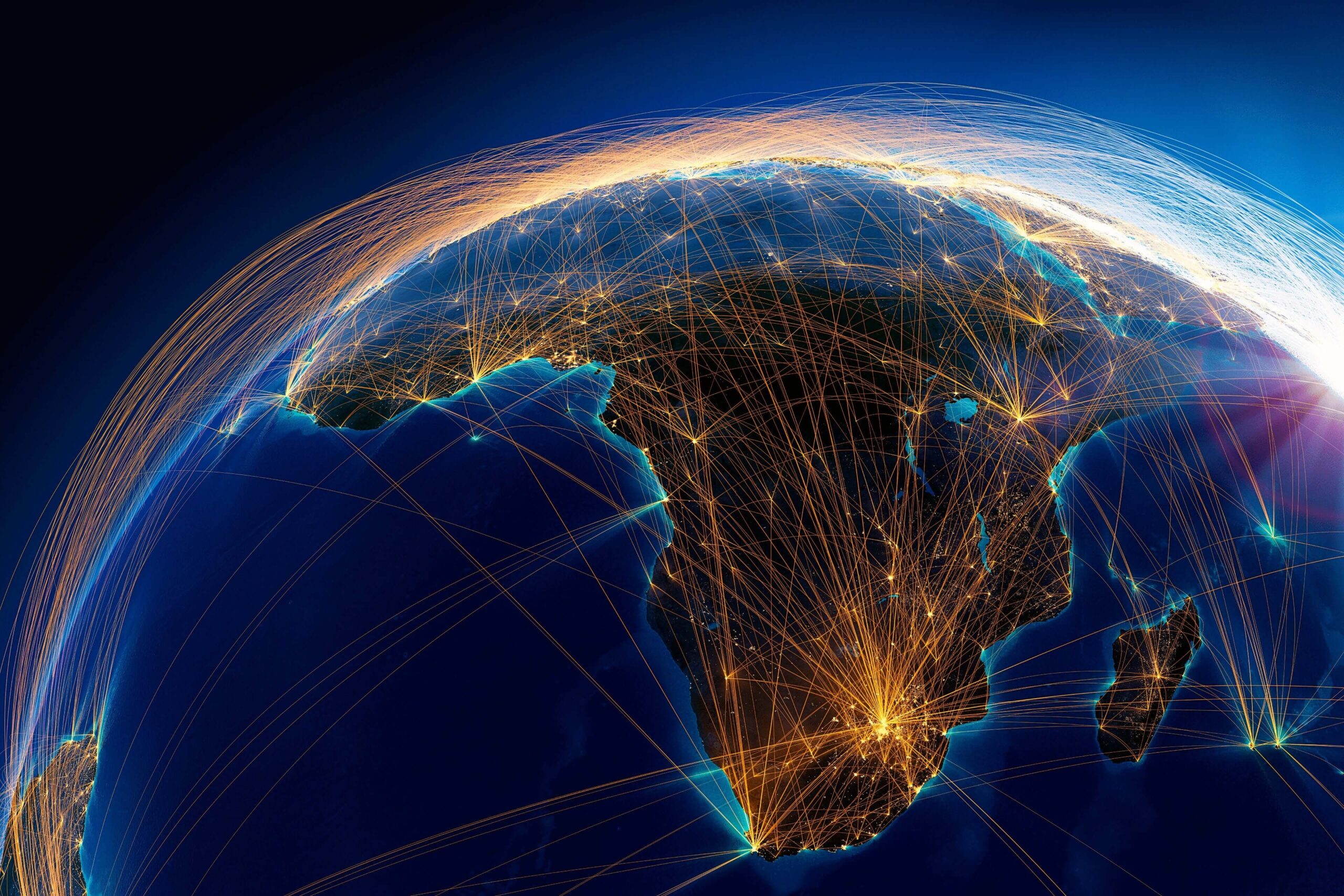 africa_illuminated_by_light_of_cities_surrounded_by_a_luminous_network_representing_major_air_routes-min3-min.jpg