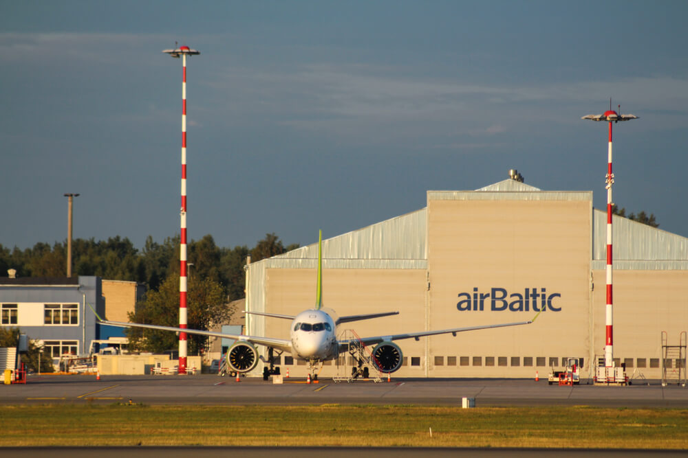 airbus_a220_at_riga_international_airport_rix_hangar.jpg