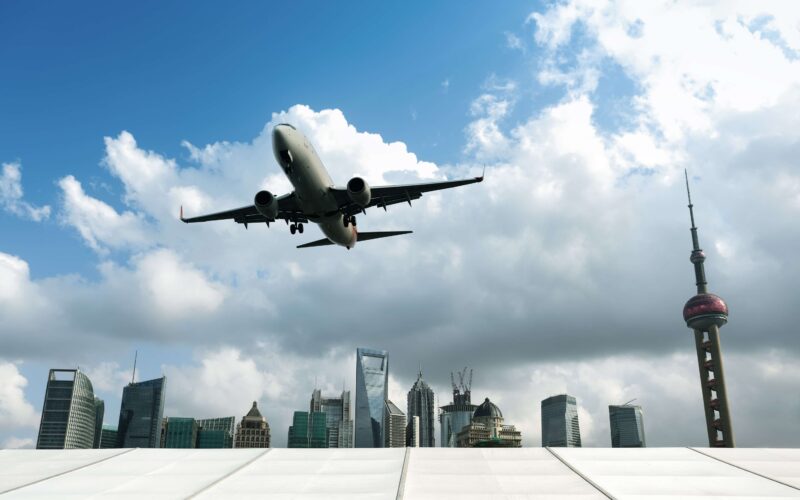 airplane_flying_over_shanghai_.jpg