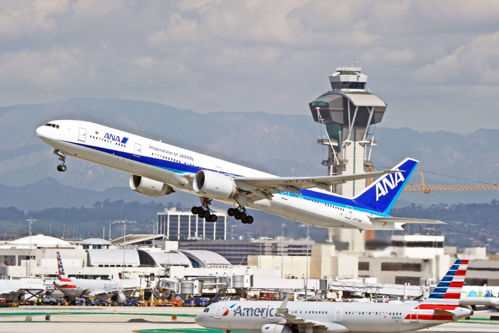 all_nippon_airways_ana_boeing_777_aircraft_is_airborne_as_it_departs_los_angeles_international_airport.-min.jpg