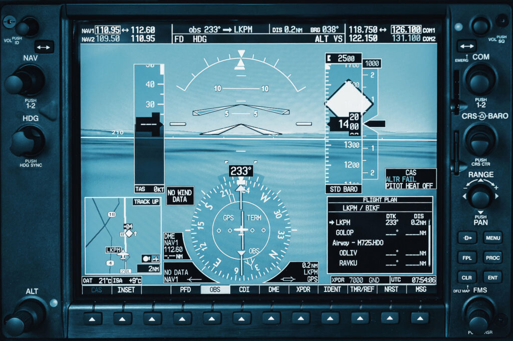 Computer in cockpit. Airplane glass cockpit display with weather radar and engine gauges in small private airplane