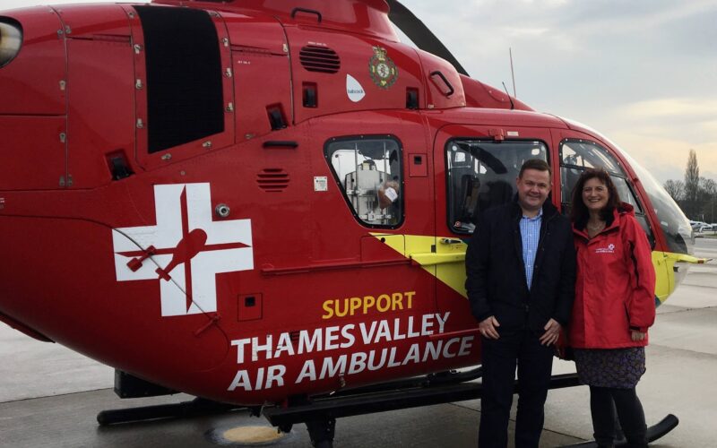 amanda_and_richard_next_to__air_ambulance_helicopter_1.jpg