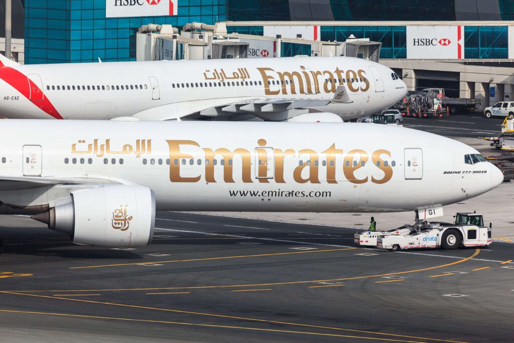 an_emirates_plane_is_pushing_back_and_getting_ready_for_take_off_in_dubai-min.jpg