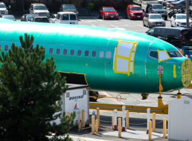 boeing_737_max_airliner_on_a_train_car_outside_the_renton_factory.jpg