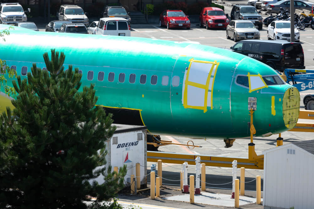 boeing_737_max_airliner_on_a_train_car_outside_the_renton_factory.jpg