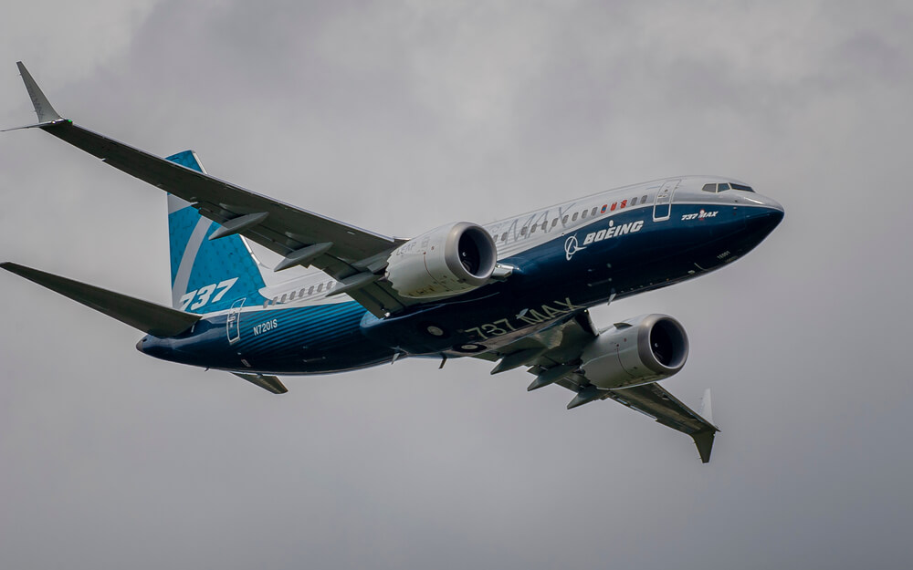 boeing_737_max_flying_over_fanrborough_air_show_in_the_united_kingdom.jpg