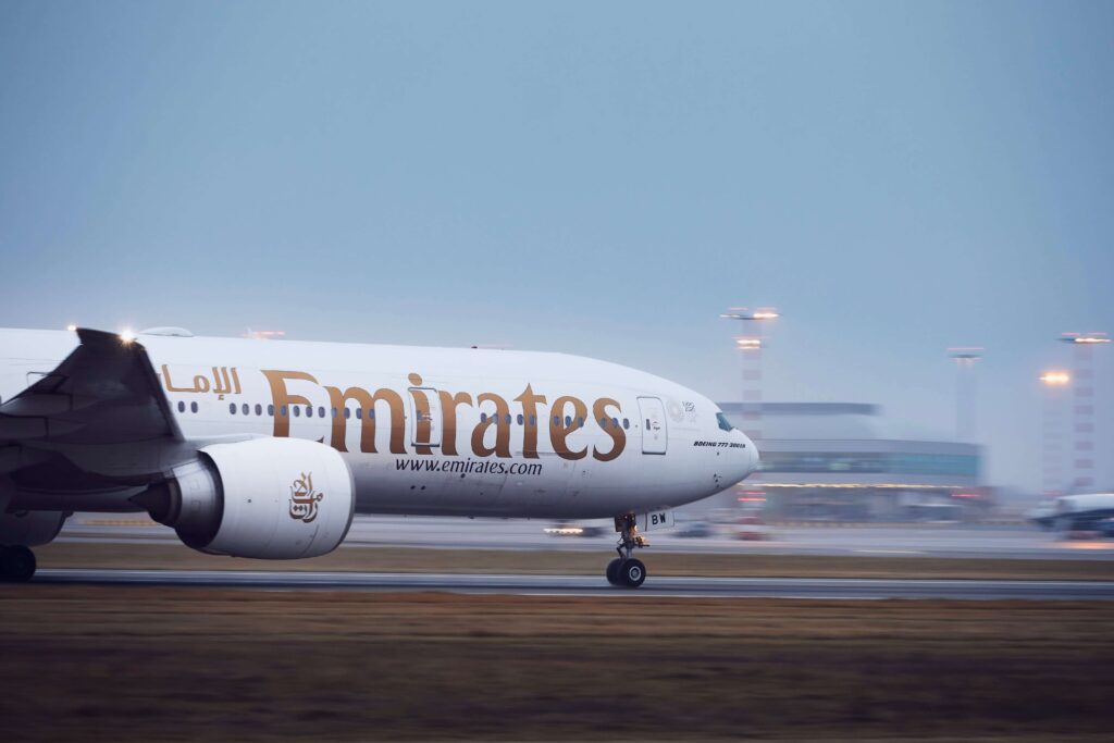 boeing_777-300er_emirates_airline_on_runway_during_take_off.-min.jpg