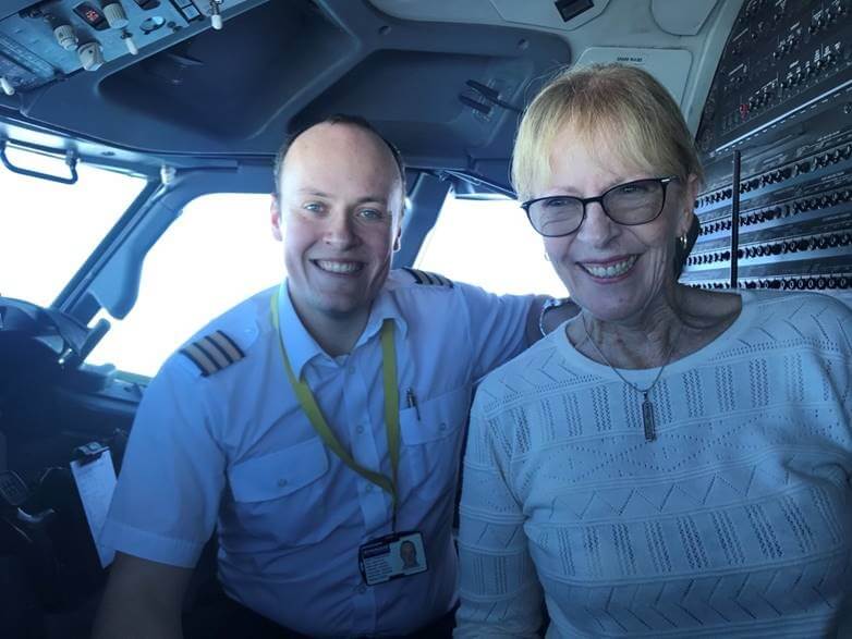 Deborah Lawrie and her son Thomas in an aircraft cockpit