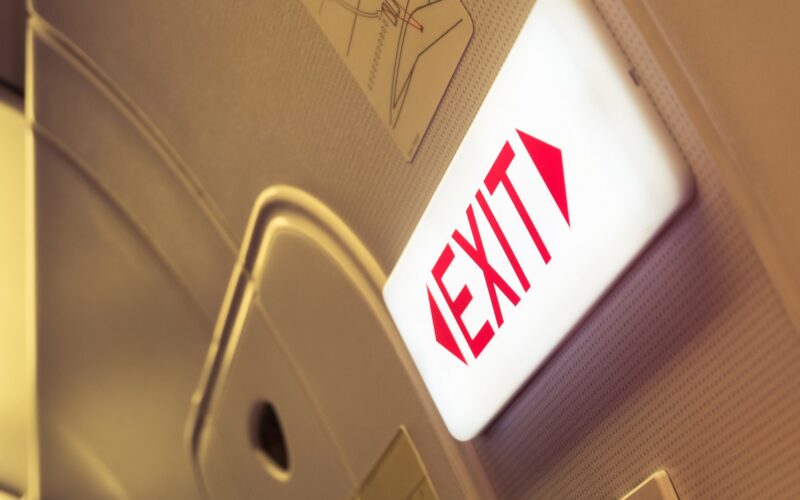 exit sign illuminated so passengers can see the exit clearly