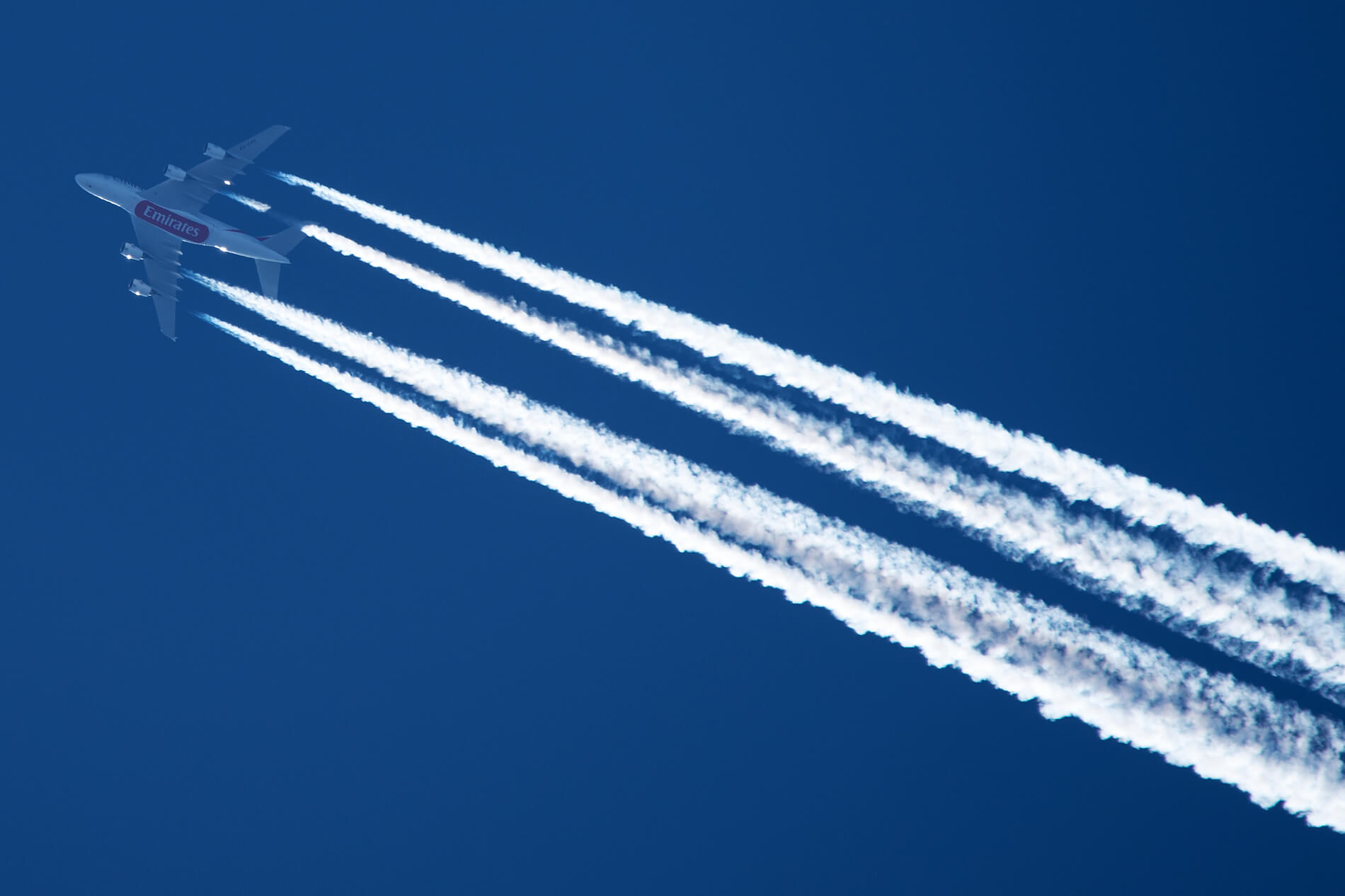 emirates_airbus_a380_flying_above_poznan_poland.jpg
