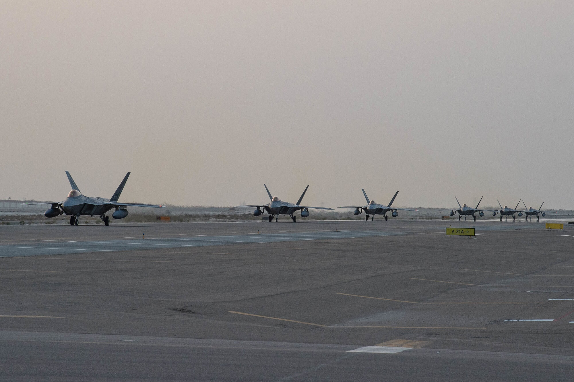 f-22_raptor_fighters_at_al_dhafra_air_base.jpg