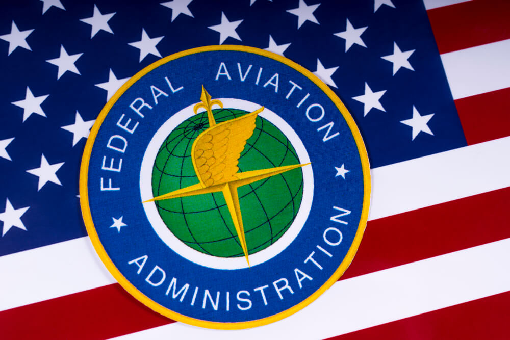 federal_aviation_administrationg_logo_with_the_united_states_flag_in_the_background.jpg