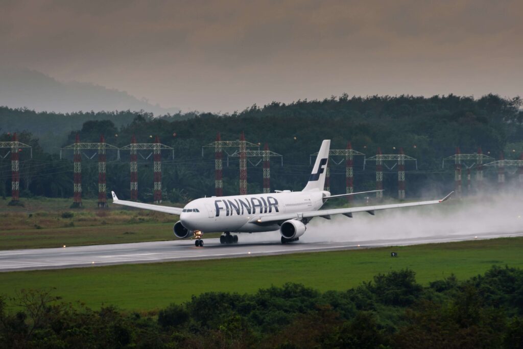 finnair_airways_airplane__airbus_333_take_off_at_krabi_airport-min.jpg
