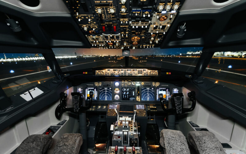 Full view of cockpit modern Boeing aircraft before take off Airplane is ready to fly Night shot in cabin Safety flight