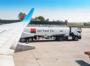 fuel kerosene truck near plane at airport runway