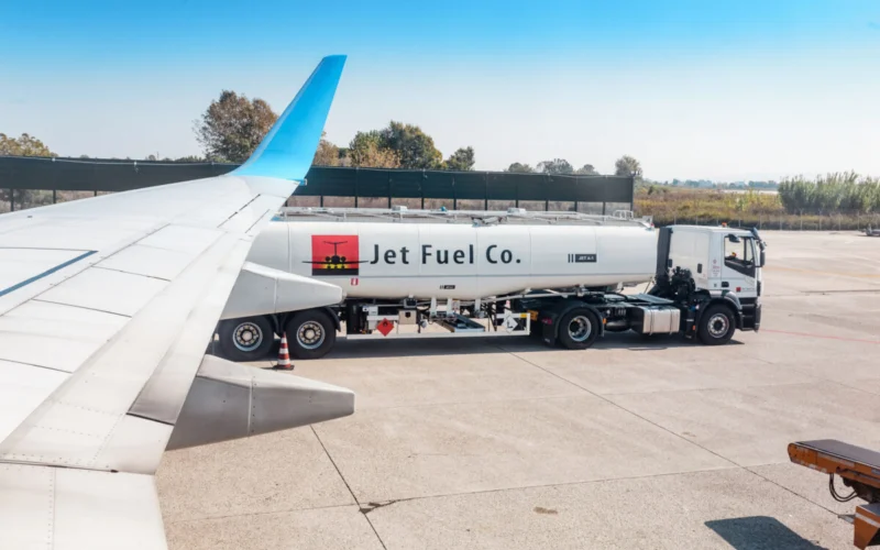 fuel kerosene truck near plane at airport runway