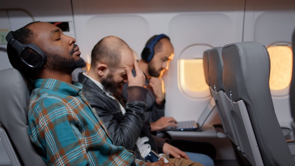 passengers resting on a plane