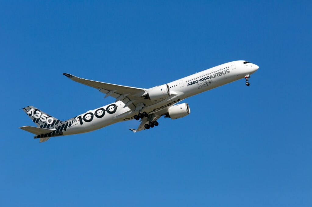 Modern passenger aircraft Airbus A350-1000 XWB taking off