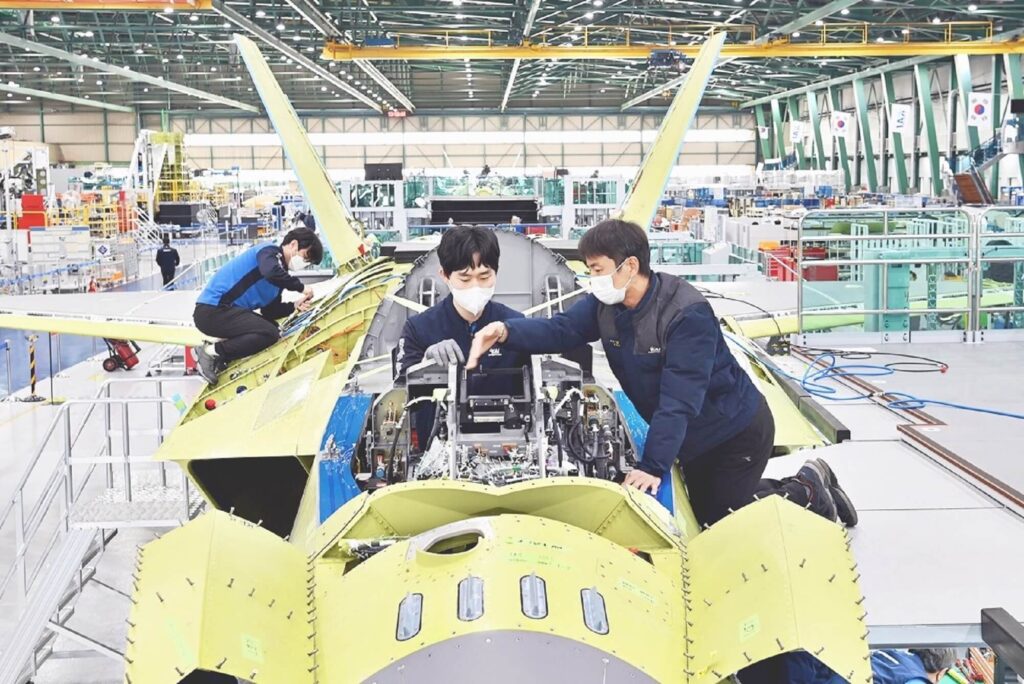 kai_workers_assembling_the_kf-x_prototype.jpg
