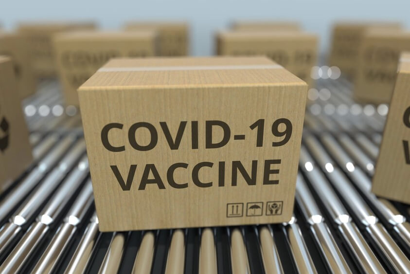 many_boxes_with_covid-19_coronavirus_disease_vaccine_on_conveyors._3d_rendering.jpg