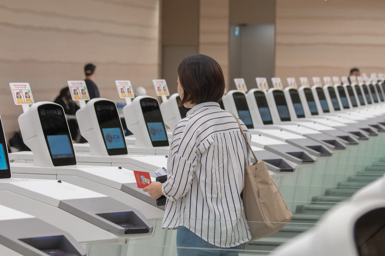 passenger_clearing_immigration_at_upgraded_changi_airport_terminal_2.jpg