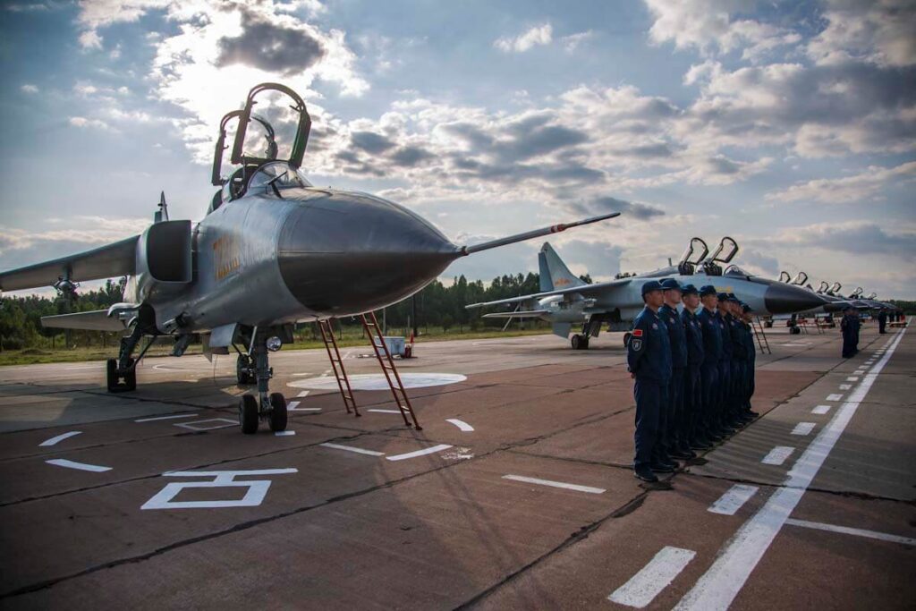 plaaf_pilots_next_to_their_bombers.jpg