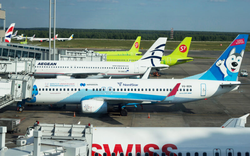 planes of different airlines are waiting for their passengers in Domodedovo airport