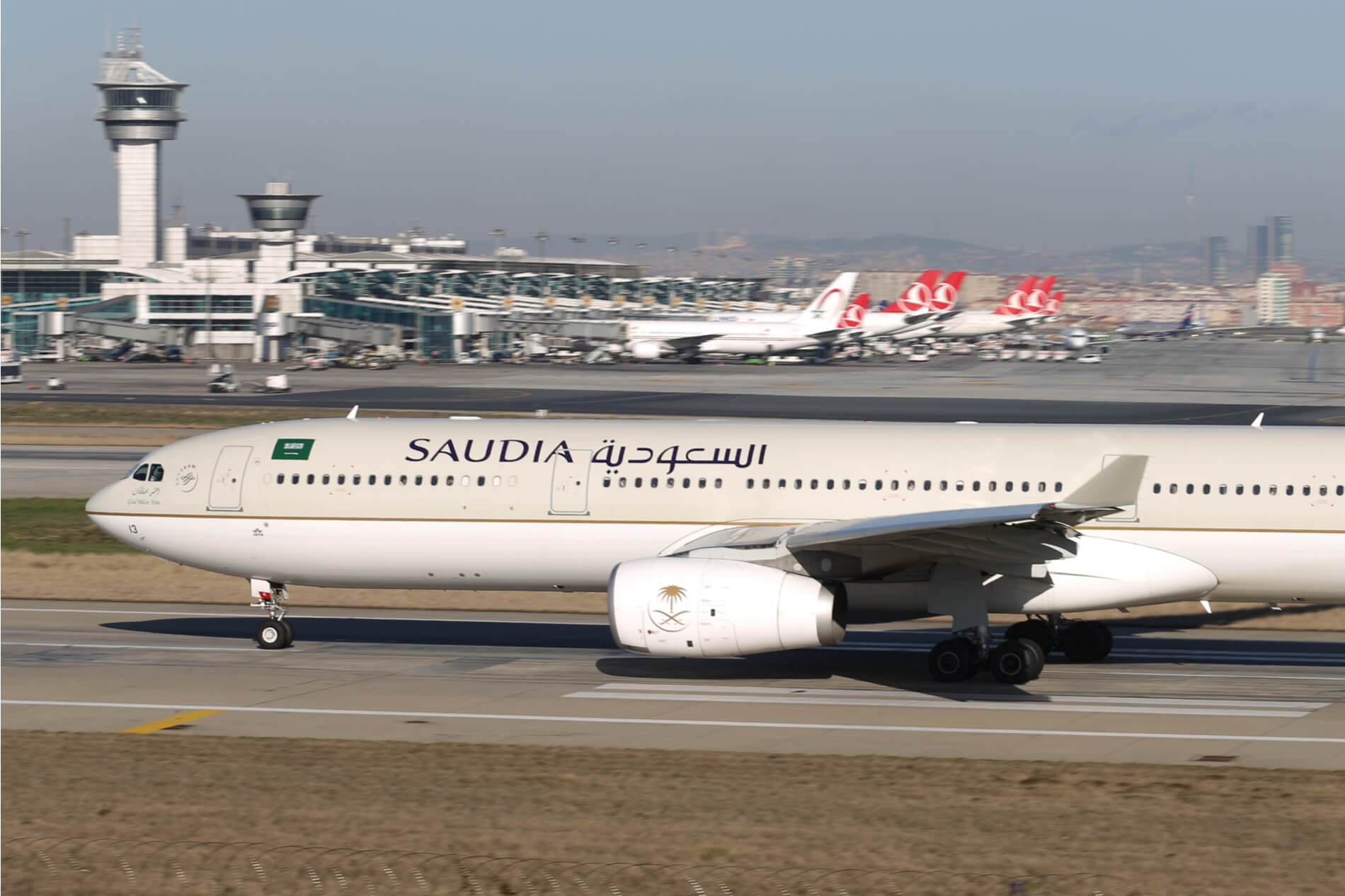 saudi_arabian_airlines_airbus_a330_taking_off_from_istanbul_ataturk_airport_isl.jpg