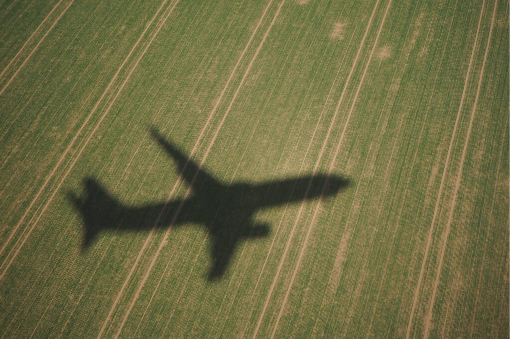 shadow of a plane in a field during landingjpg shadow_of_a_plane_in_a_field_during_landing.jpg
