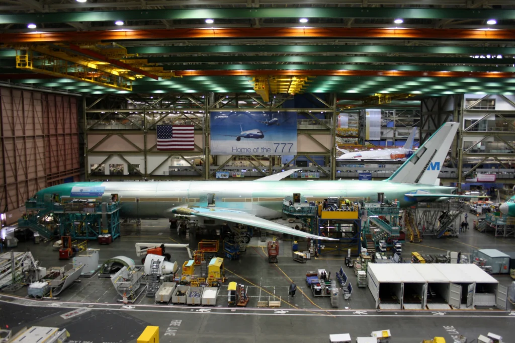 Boeing employees continue work building a Boeing 777 jets Boeing employees continue work building a Boeing 777 jets
