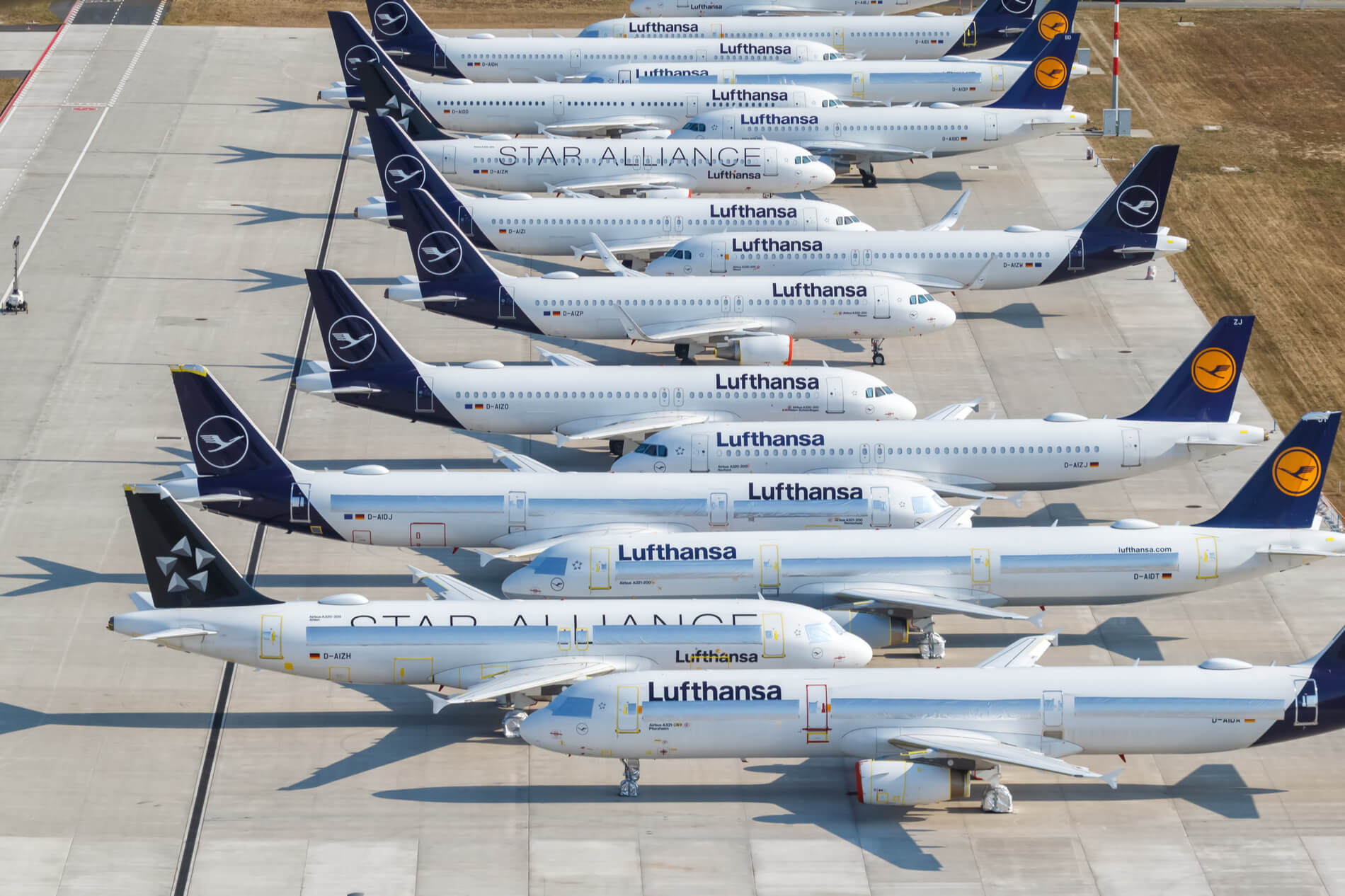 stored_lufthansa_airbus_a320_family_aircraft_at_berlin_brandenburg_airport_ber-1.jpg