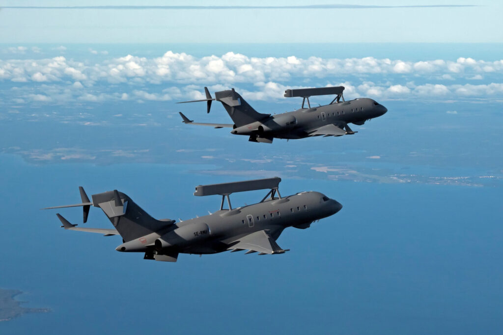 Two GlobalEye aircraft flying in formation