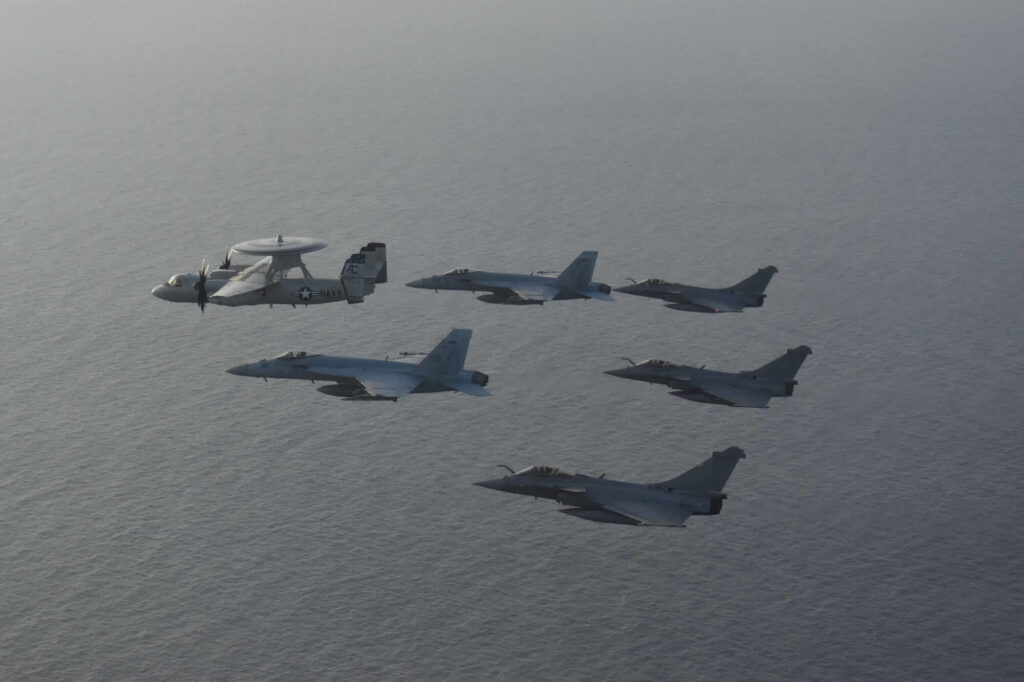 us navy fa 18 and french dassault rafale flying togetherjpg us_navy_fa-18_and_french_dassault_rafale_flying_together.jpg