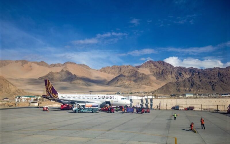 vistara_aviation_airplane_has_been_arrived_in_leh_airport_with_clear_cold_sky_in_himalayan_snow_mountain_background..jpg