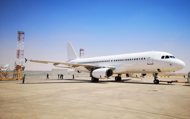 white_aircraft_in_desert_airport.jpg
